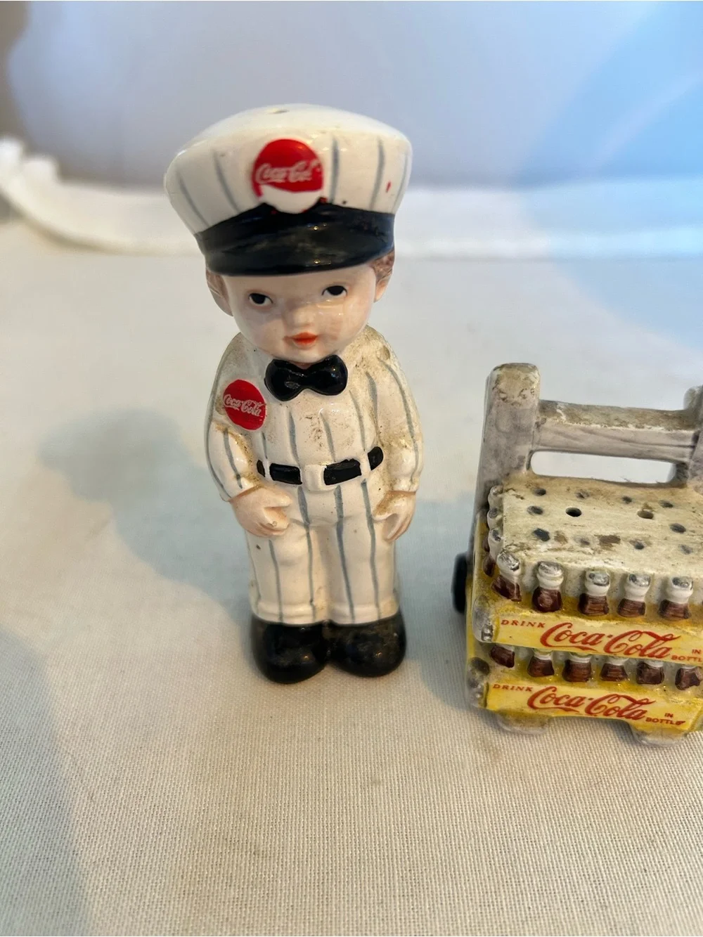 Coca Cola delivery man salt and pepper shakers with Yellow Bottle Crates